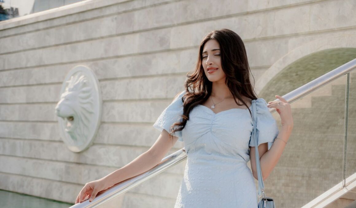 Elegancka rozkloszowana sukienka midi z bufiastymi rekawami czy sukienka midi z bufiastymi rekawami